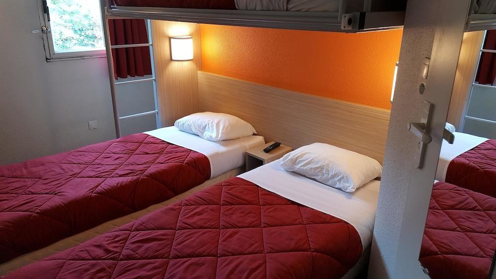 Premiere Classe Montreuil Экстерьер фото A typical room at a B&B